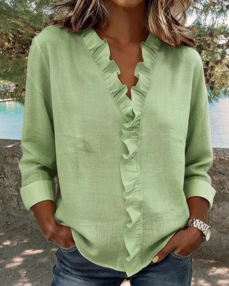 CHIARA | BLUSA CON ESCOTE EN V Y DELICADOS VOLANTES