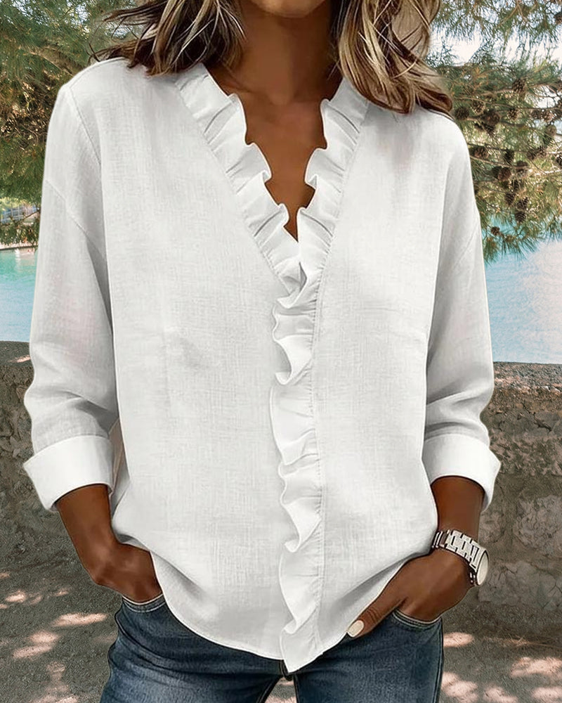 CHIARA | BLUSA CON ESCOTE EN V Y DELICADOS VOLANTES